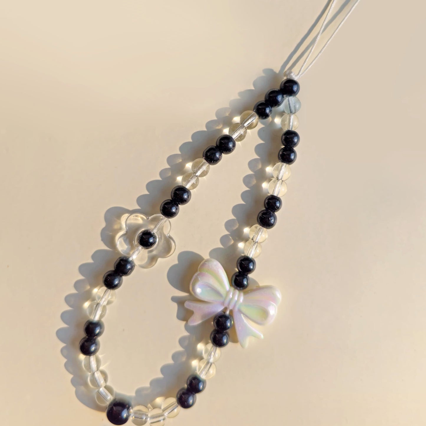 Pretty black white cute phone charm