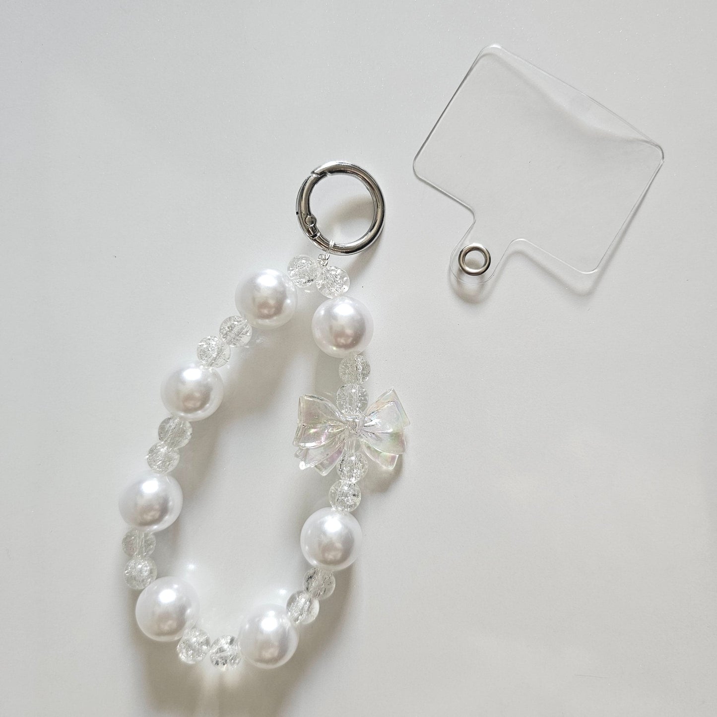 Iridescent Bow Pearl Halo Loop Phone Charm