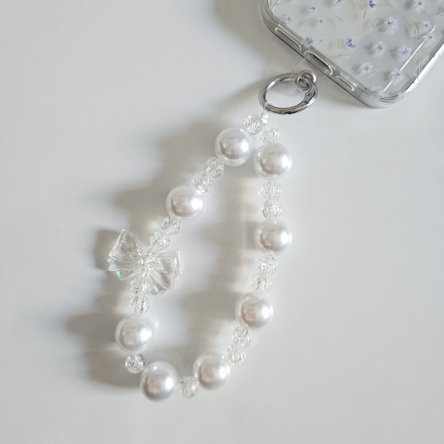 Iridescent Bow Pearl Halo Loop Phone Charm