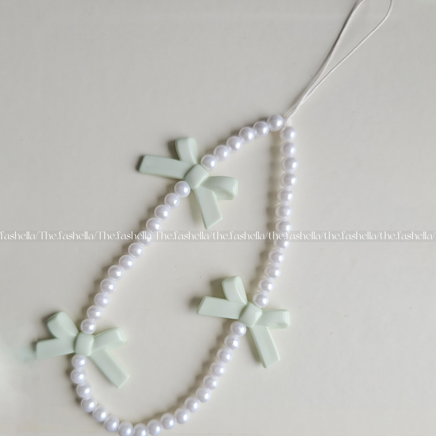 Aesthetic pearl &green bow charm